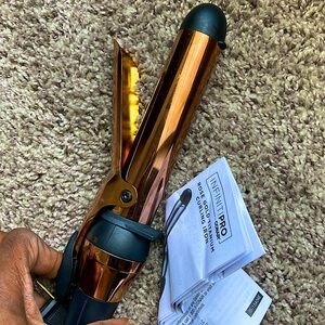 Infiniti Pro Conair 1/4 Inch Rose Gold Titanium Curling Iron  Loose Curls